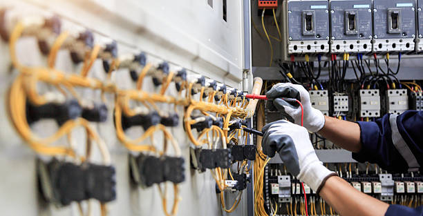 Professional Electrician technician working in Halls, TN